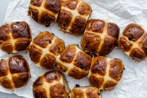 Hot cross buns on white paper Bellbird Bakery Christchurch