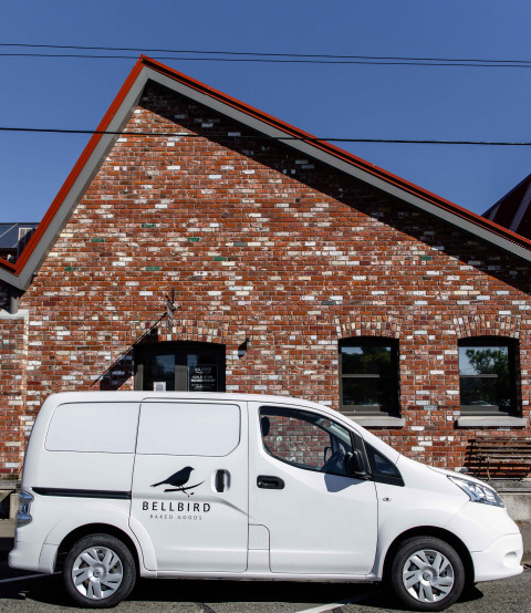 Bellbird delivery van in front of the Tannery Christchurch