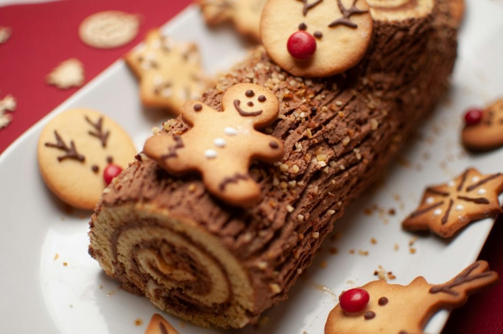 Bûche de Noël (Chocolate Hazelnut Yule Log) a traditional French Christmas dessert shaped and decorated like a log