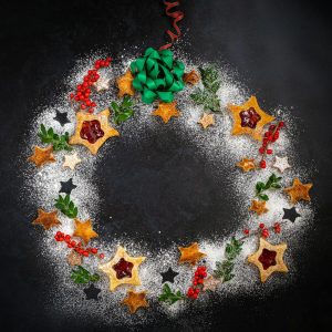 Top View of Christmas Cookies on black board