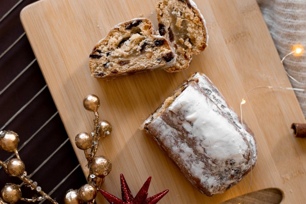 Fruit Stollen on wooden board seen from above