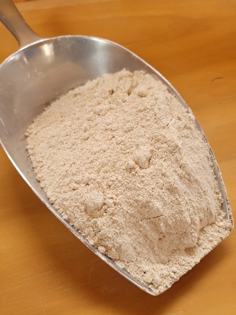 Whole grain flour in scoop Milmore Downs Canterbury NZ