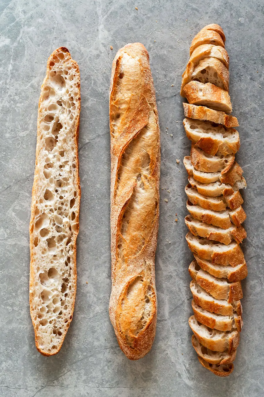 Baguette cut in half and chunks showing crumb