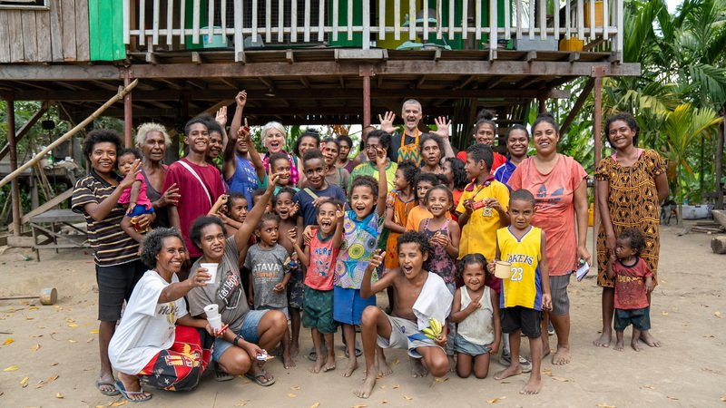 Oonagh and Mike visiting a cacao growing village in PNG