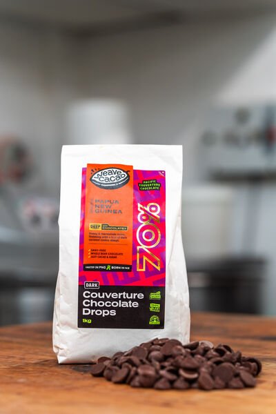 Weave 70% Chocolate Drops with bag on bench at Bellbird Bakery