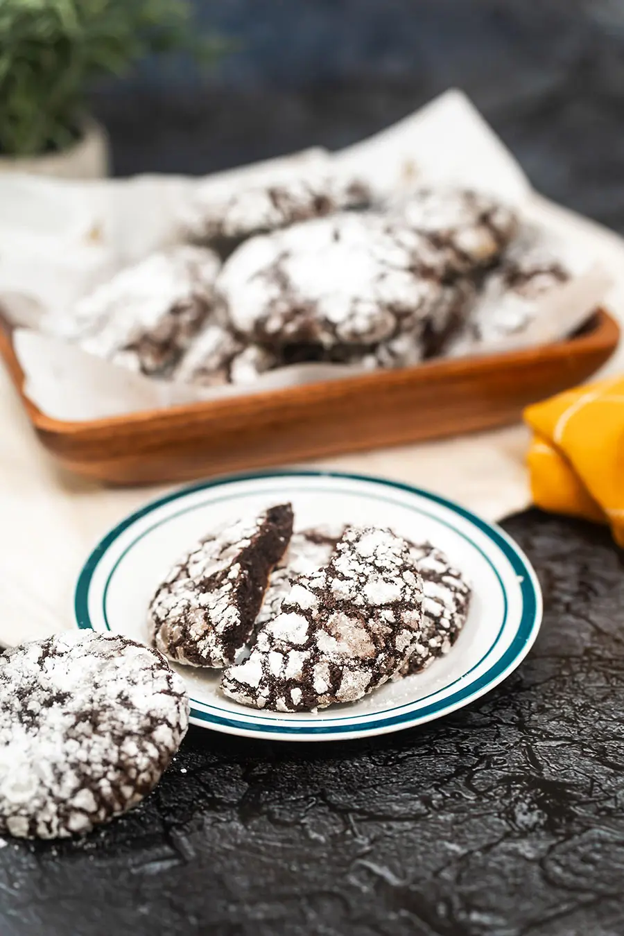 Chocolate Crinkle Cookie on plate and more surrounding