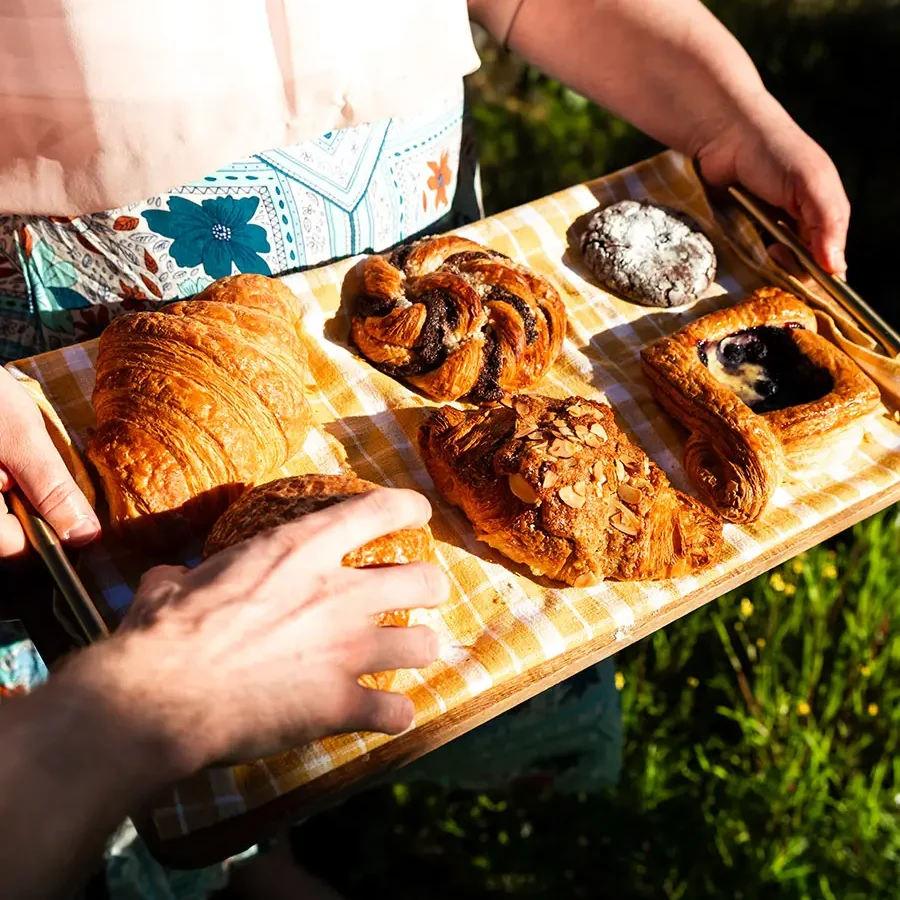Selection of pastries on wood board