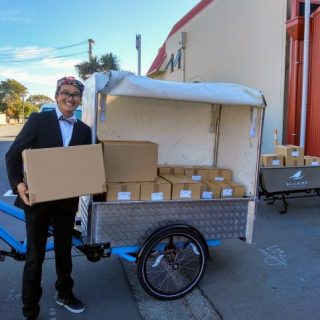 Ken taking boxes on his e-trike for home deliveries during Covid-19 lockdown, Bellbird Bakery